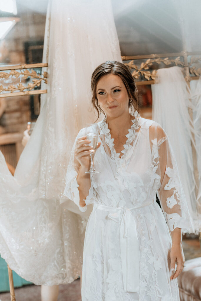 bride in front of wedding dress